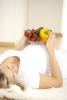 Young Pretty Pregnant Woman With Vegetables Royalty Free Stock Image Young Pretty Pregnant Woman With Vegetables Royalty Free Stock Image