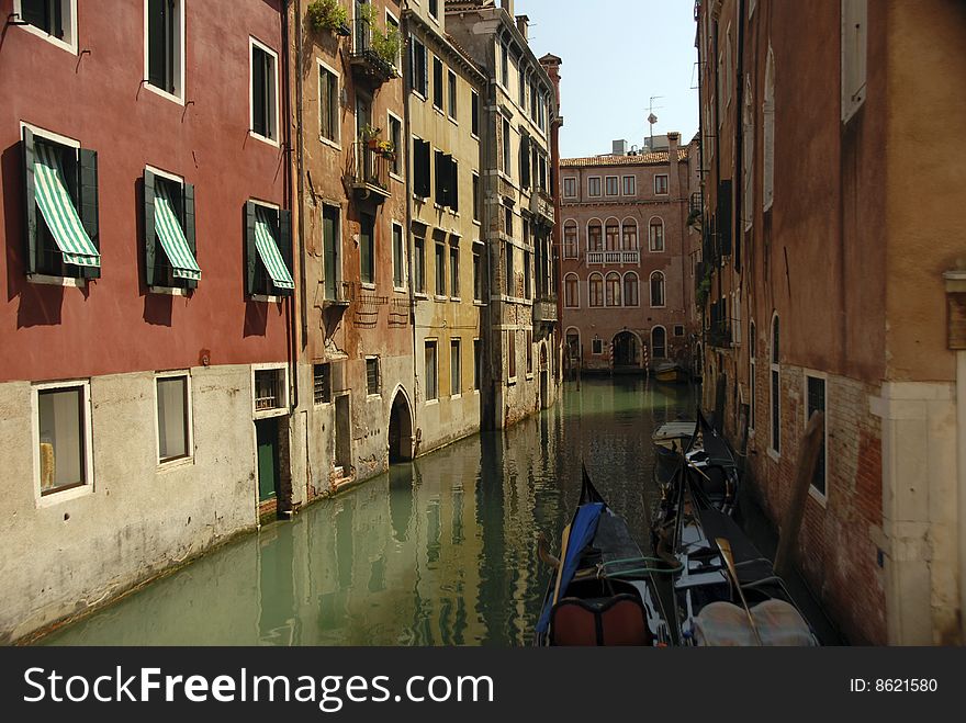 Canal with gondolas in Venice, Italy. Canal with gondolas in Venice, Italy
