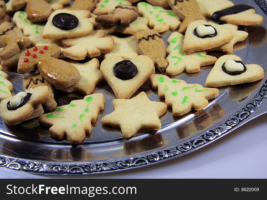 Christmas plate with beautiful biscuits. Old tradition. Christmas plate with beautiful biscuits. Old tradition.