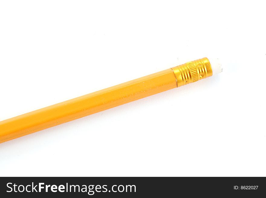 The yellow pencil on a white background