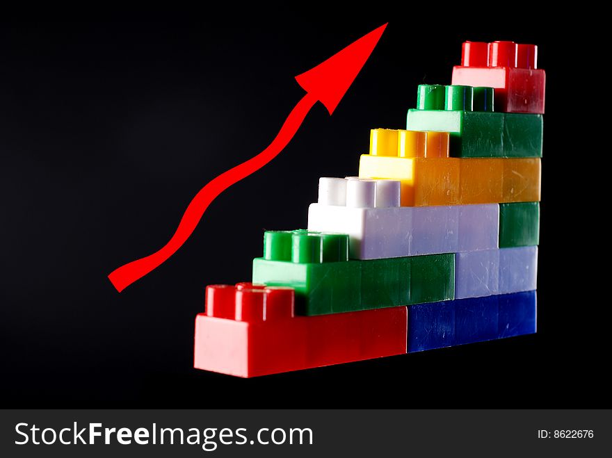 Toy Piramid With Red Arrow