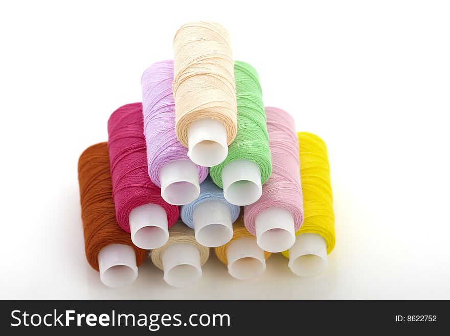 Image of the colorful spools threads