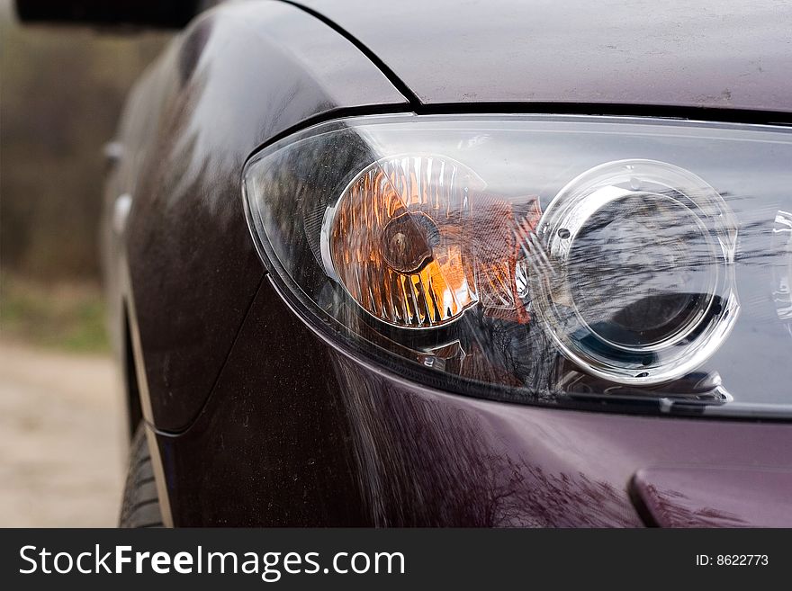 Forward Headlight Of The Car