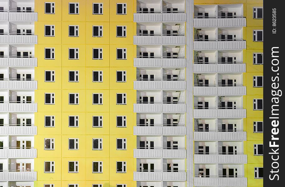 Yellow Building With White Balconies