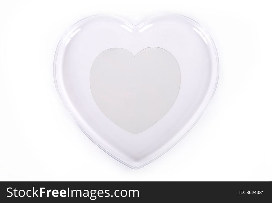 Glass heart isolated on a white background