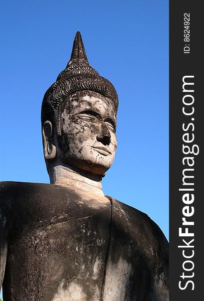 A Big Stone sculpture of Buddha  in Laos