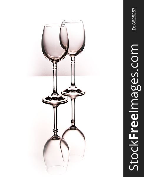 Abstract light background with two wine glasses, isolated. Abstract light background with two wine glasses, isolated.