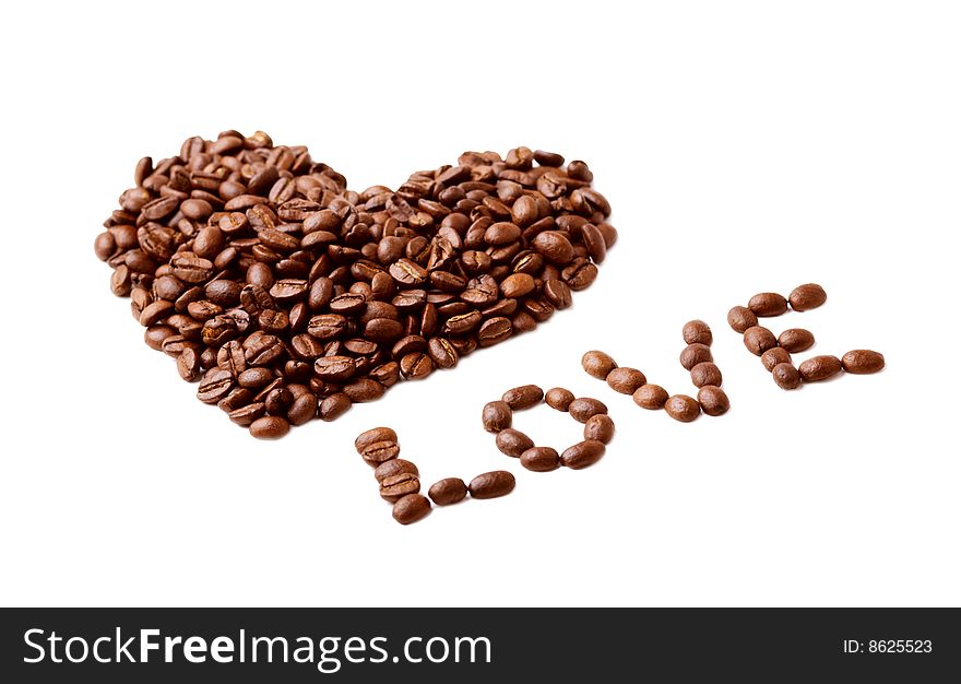 Heart made of coffee beans on white background