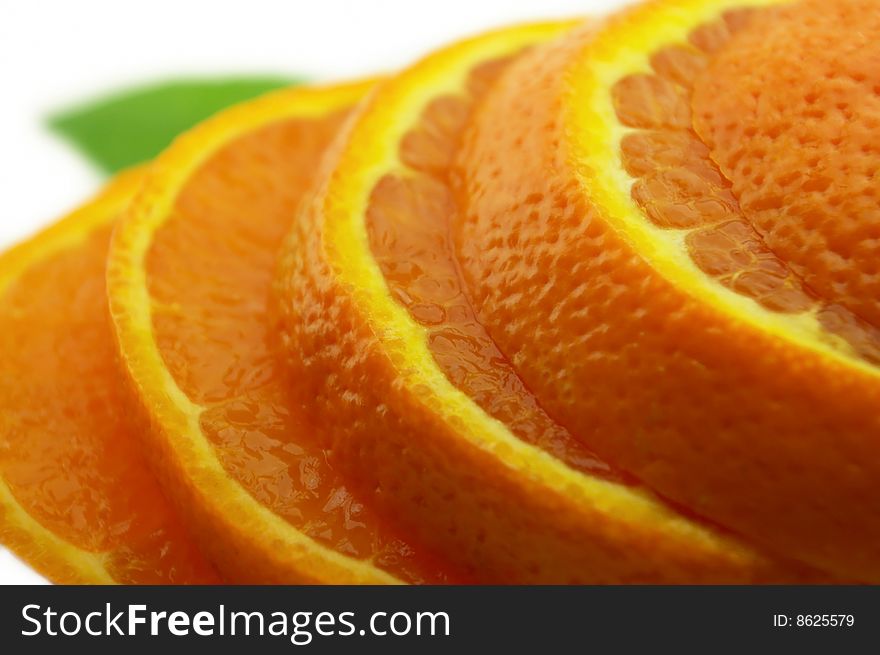 Orange with leaf on a white background