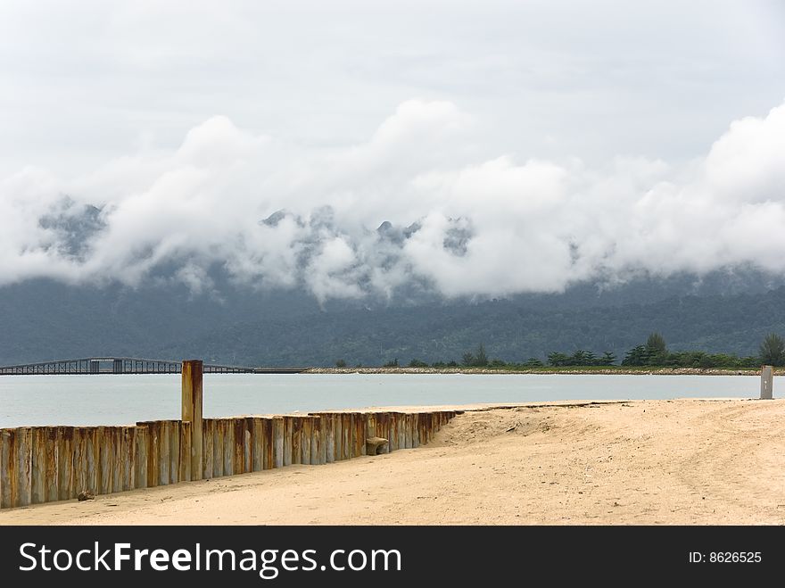 Langkawi beach and clouds on mountains