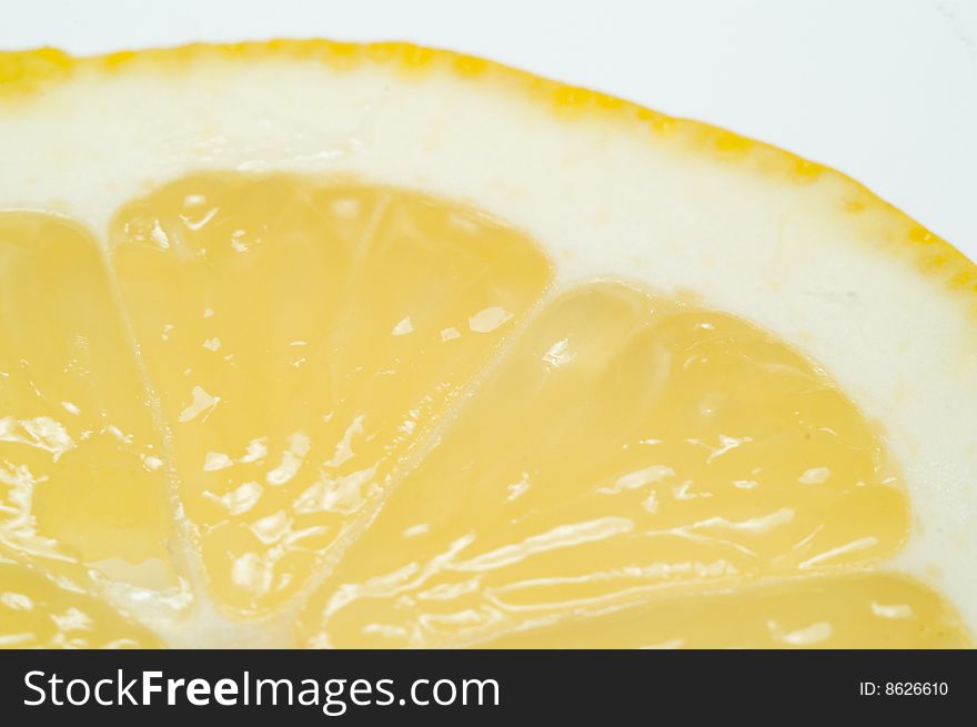 Part of lemon isolated on white