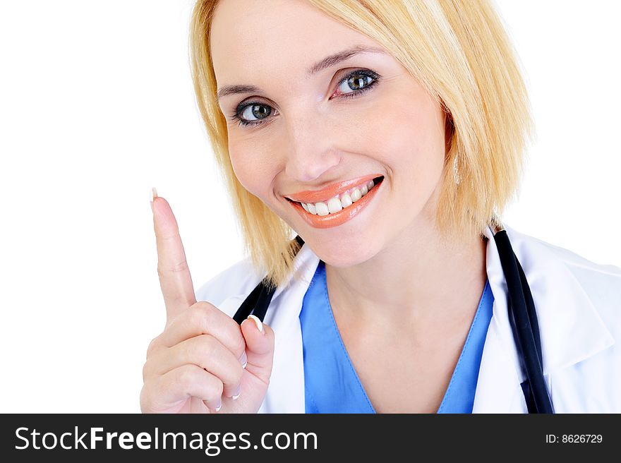 Beautiful smiling woman doctor showing forefinger