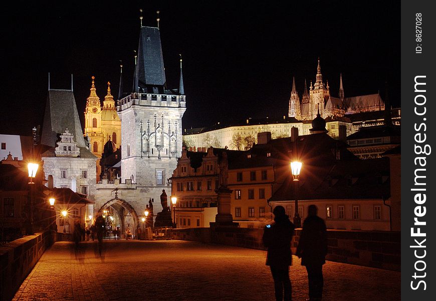 Colourful Charles Bridge in Prague with Castle in the Night