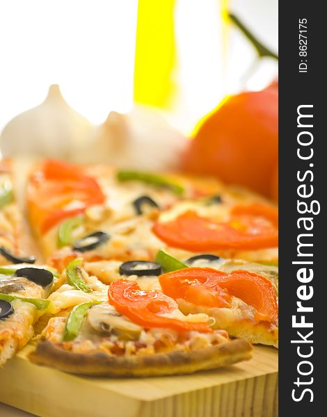 Homemade pizza with fresh tomato olive mushroom cheese isolated. Homemade pizza with fresh tomato olive mushroom cheese isolated