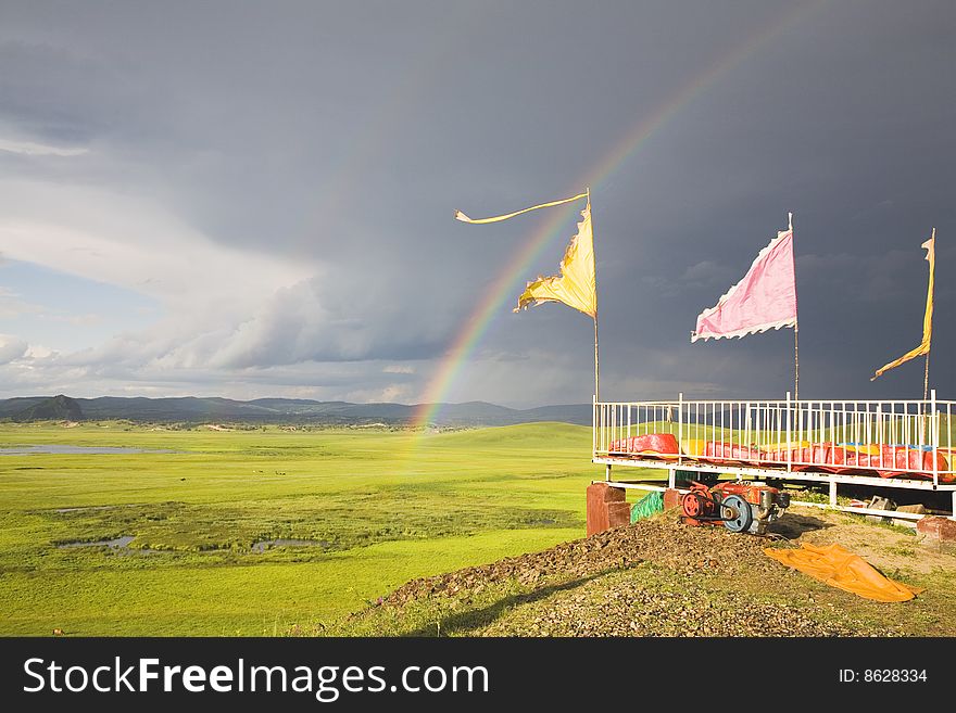 A rainbow arched across the sky