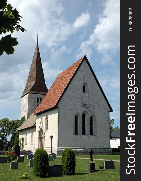 Medieval church on the island of Gotland, Sweden, white clouds in the sky. Medieval church on the island of Gotland, Sweden, white clouds in the sky.