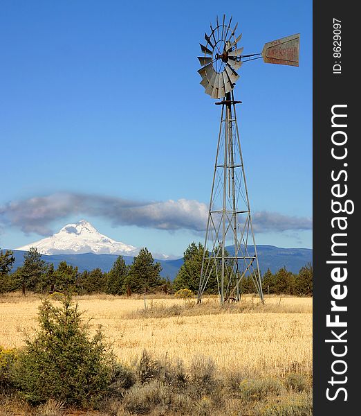 This windmill and mount hood in the background was taken near maupin oregon. This windmill and mount hood in the background was taken near maupin oregon.