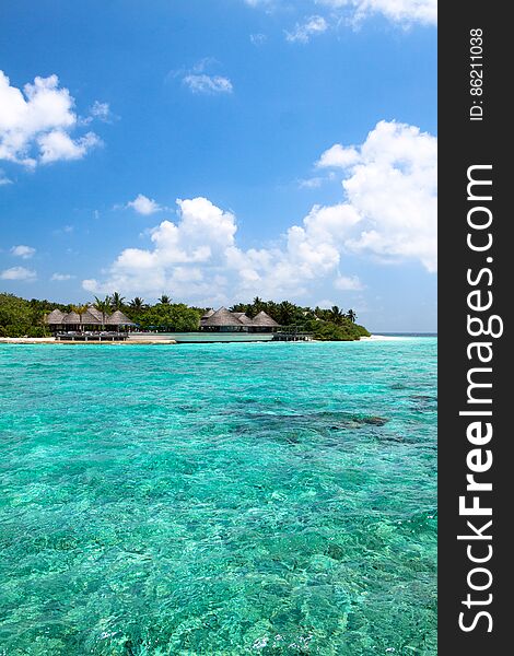 Lagoon and beach bungalows on Maldives Island