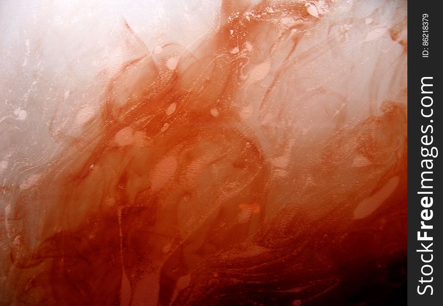 I tried to tint some drawing paper in a bath of water and sepia ink. It didn&#x27;t work, but at least I got this photo of the ink and water mixing.