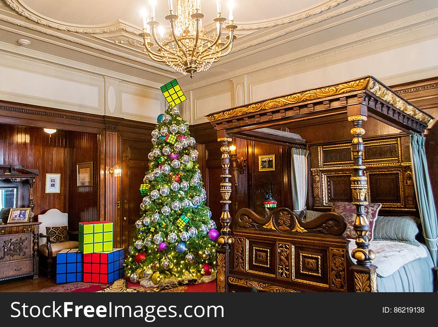 Christmas tree, Property, Christmas ornament, Decoration, Light, Building