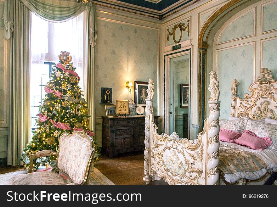 Christmas tree, Picture frame, Property, Building, Plant, Window