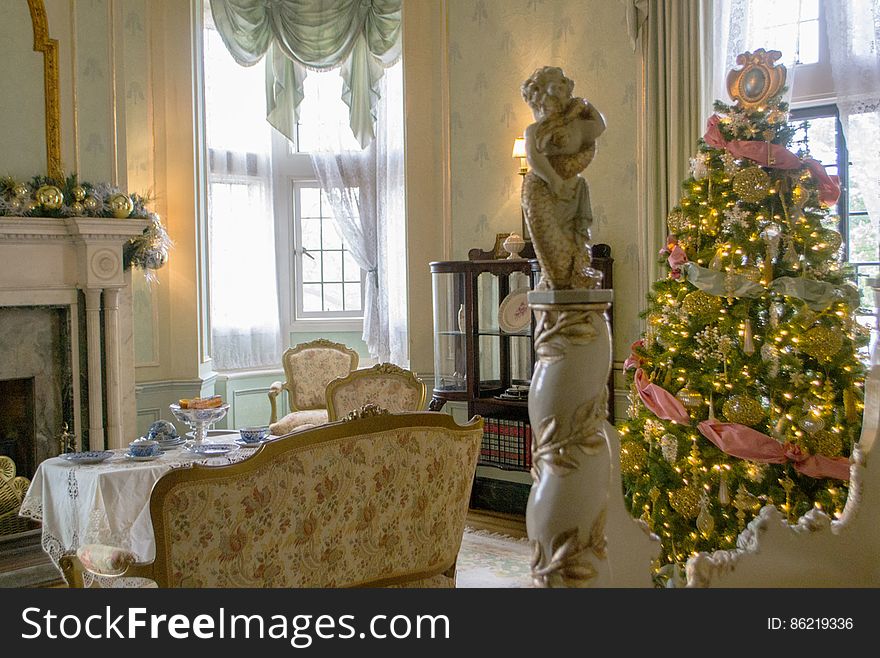 Christmas tree, Furniture, Property, Window, Couch, Decoration