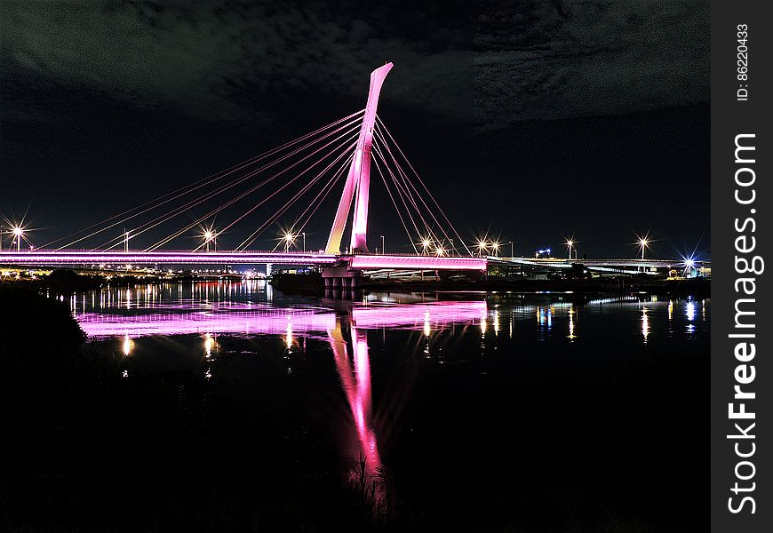 An illuminated bridge in the night. An illuminated bridge in the night.