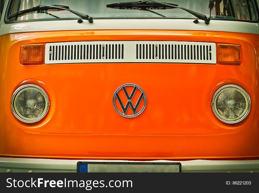 Orange Volkswagen Beatle Van