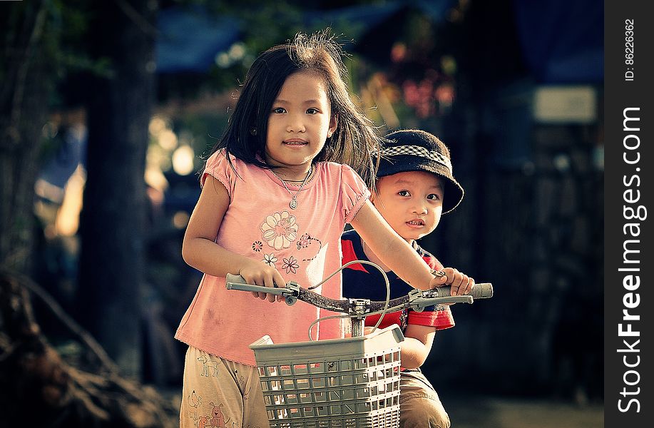 Children Riding Bicycle