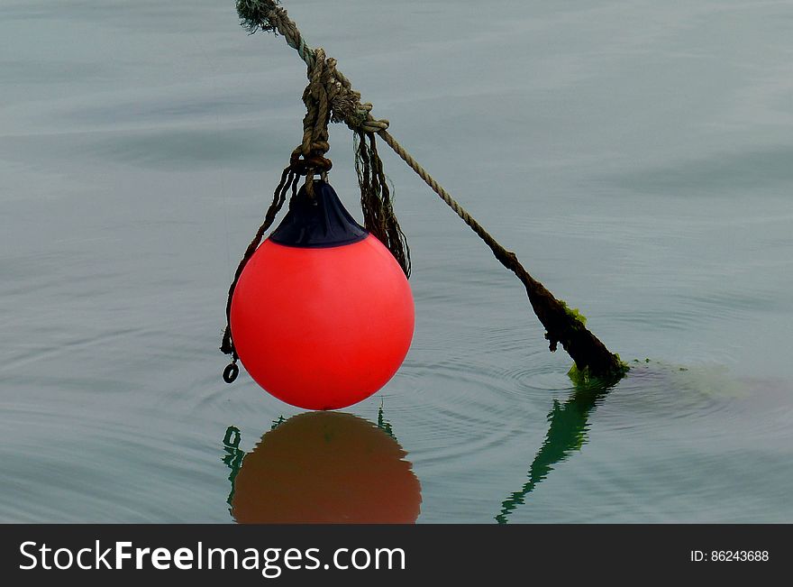 A buoy is a floating device that can have many purposes. It can be anchored &#x28;stationary&#x29; or allowed to drift with the sea wave. The word, of Old French or Middle Dutch origin, is &#x28;in UK English&#x29; now most commonly pronounced /ËˆbÉ”Éª/ &#x28;identical with boy, as in buoyancy&#x29;. In American English the pronunciation is closer to &#x22;boo-ee.&#x22;. A buoy is a floating device that can have many purposes. It can be anchored &#x28;stationary&#x29; or allowed to drift with the sea wave. The word, of Old French or Middle Dutch origin, is &#x28;in UK English&#x29; now most commonly pronounced /ËˆbÉ”Éª/ &#x28;identical with boy, as in buoyancy&#x29;. In American English the pronunciation is closer to &#x22;boo-ee.&#x22;