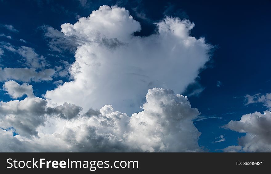 Blue skies with white billowy clouds. Blue skies with white billowy clouds.