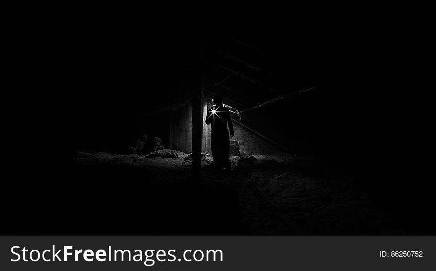 Low Angle View of Man Standing at Night