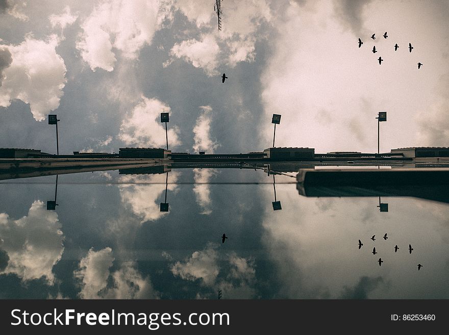 Reflection Of Clouds In Sky