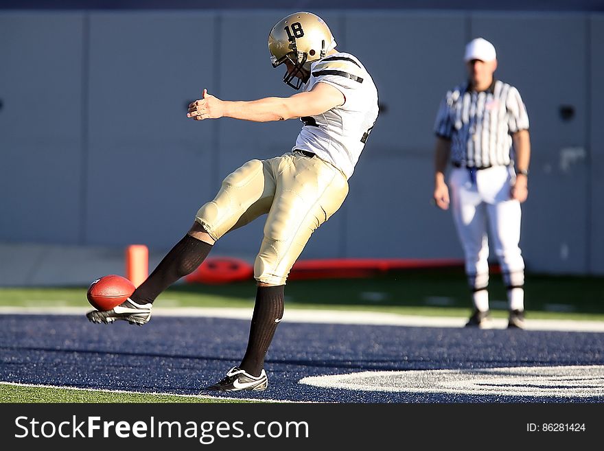 American Football Kicking the Ball