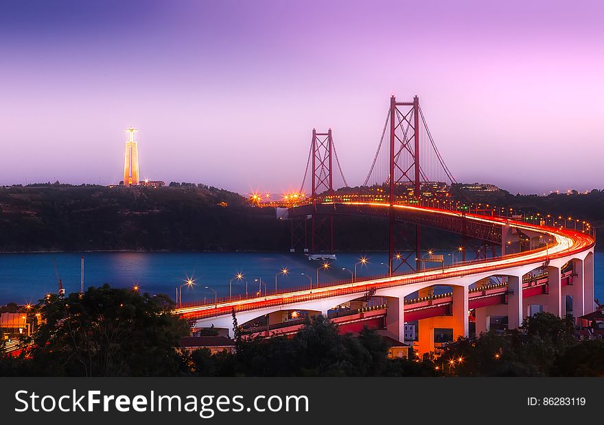 The Vasco da Gama Bridge, a bridge flanked that spans the Tagus River in in Lisbon, Portugal.