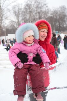 Girl On Ice Slope With Mother Royalty Free Stock Photo