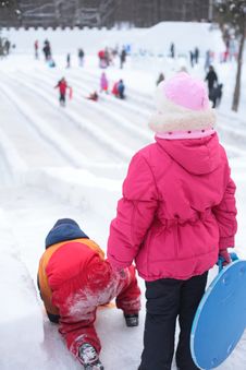 Children On Ice Slope In Park Stock Photo Children On Ice Slope In Park Stock Photo