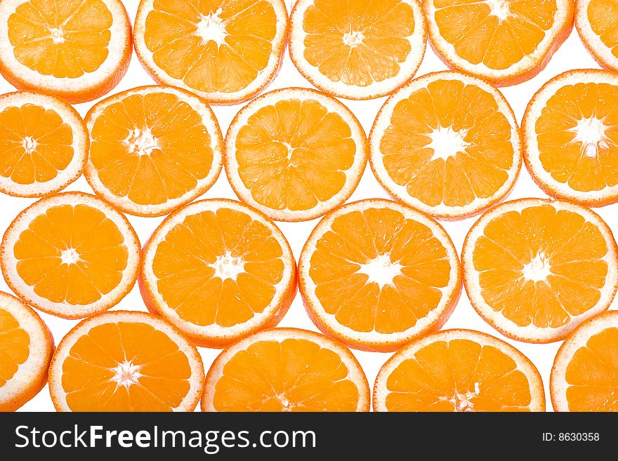 It is a lot of segments of oranges on a white background. It is a lot of segments of oranges on a white background
