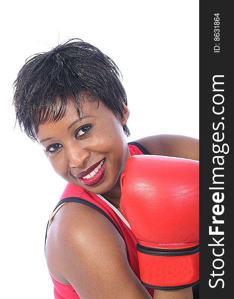 Young woman in the gym with boxing gloves. Young woman in the gym with boxing gloves