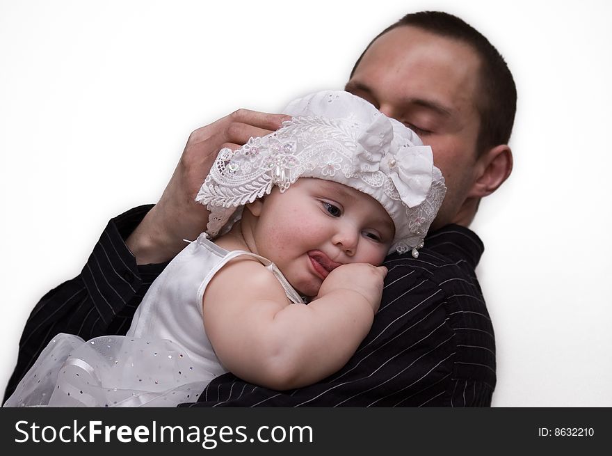 10 months old daughter hugging her father. 10 months old daughter hugging her father.