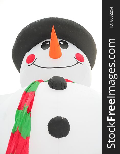 Inflatable snowman on white background