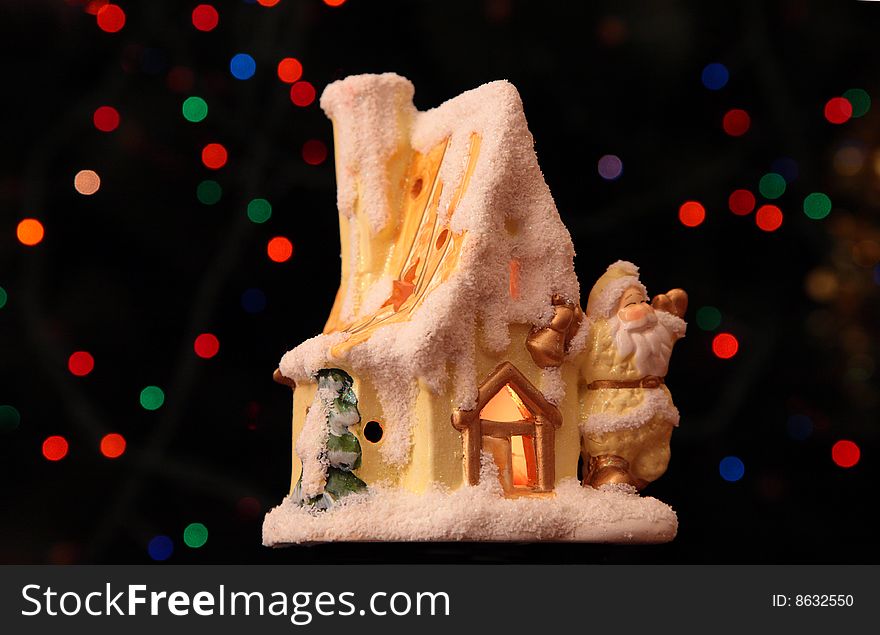 Toy small house with Santa Claus