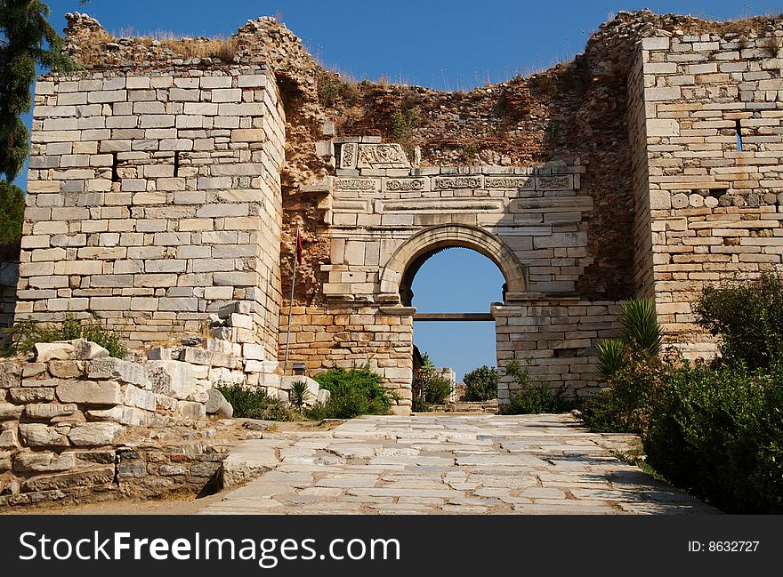 The stone gate that leads through the walls and into the Church of St John, Selcuk, Turkey. The stone gate that leads through the walls and into the Church of St John, Selcuk, Turkey