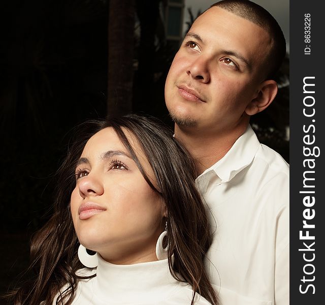 Young couple glancing at the light