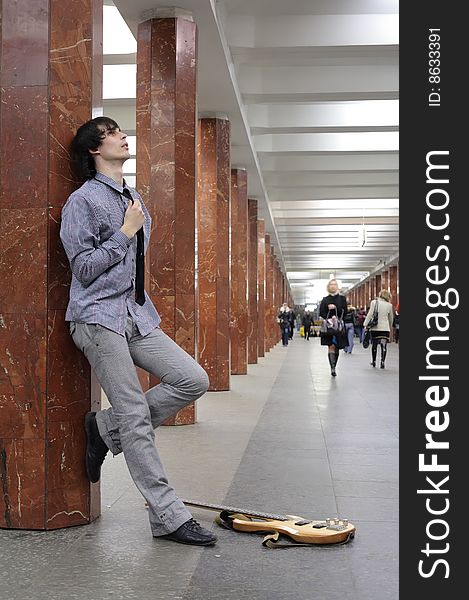 Young musician at metro station