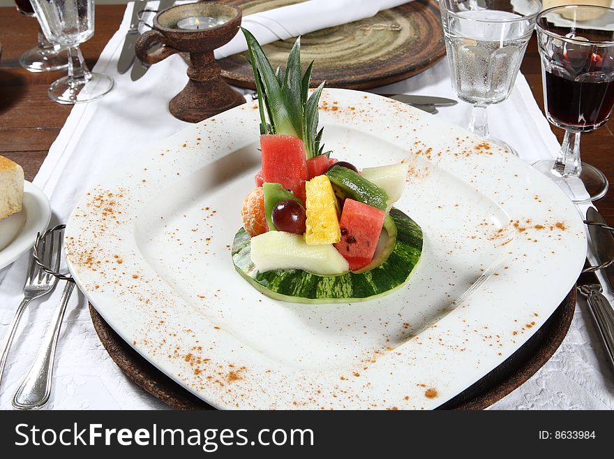 Delicious Fresh fruitsalad on a square white plate