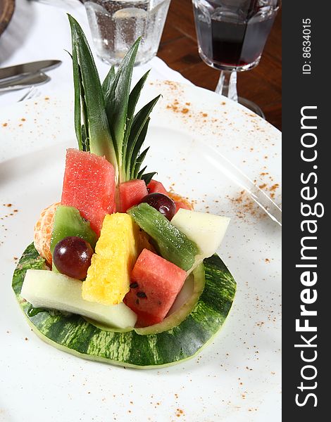 Delicious Fresh fruitsalad on a square white plate
