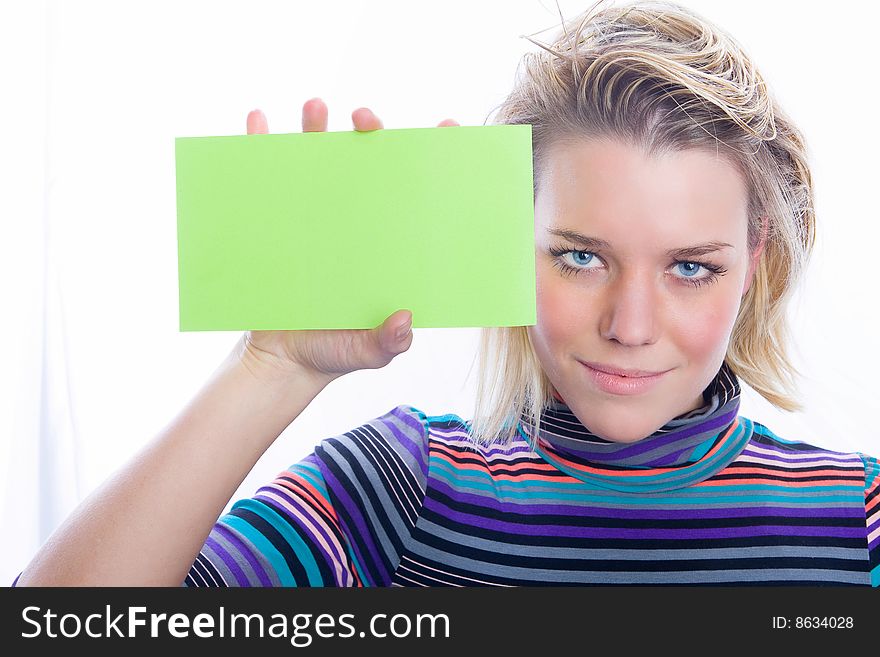 Female holding sign or board