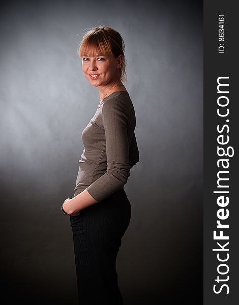 Portrait of female on a grey background in studio