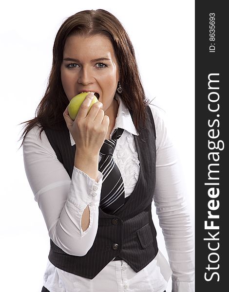 Isolated business woman eating green apple white background. Isolated business woman eating green apple white background